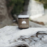 Genesis Magnesium Tallow on a log