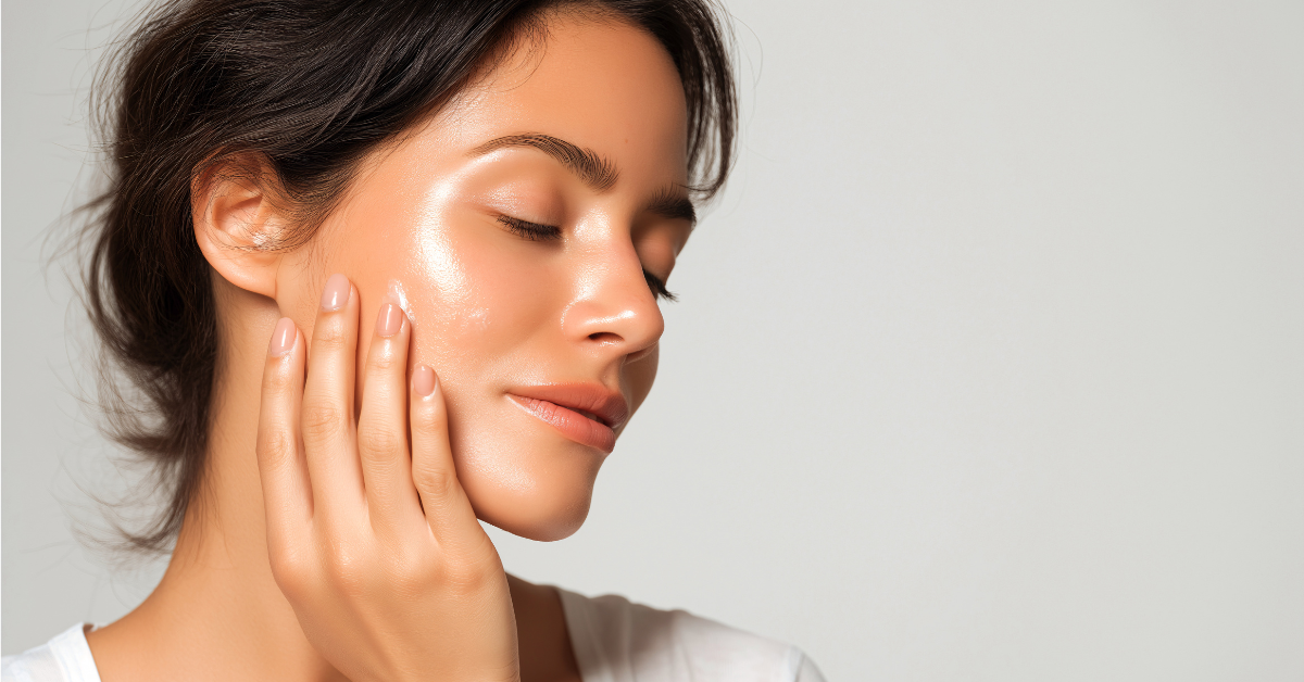 Mature woman applying face oil