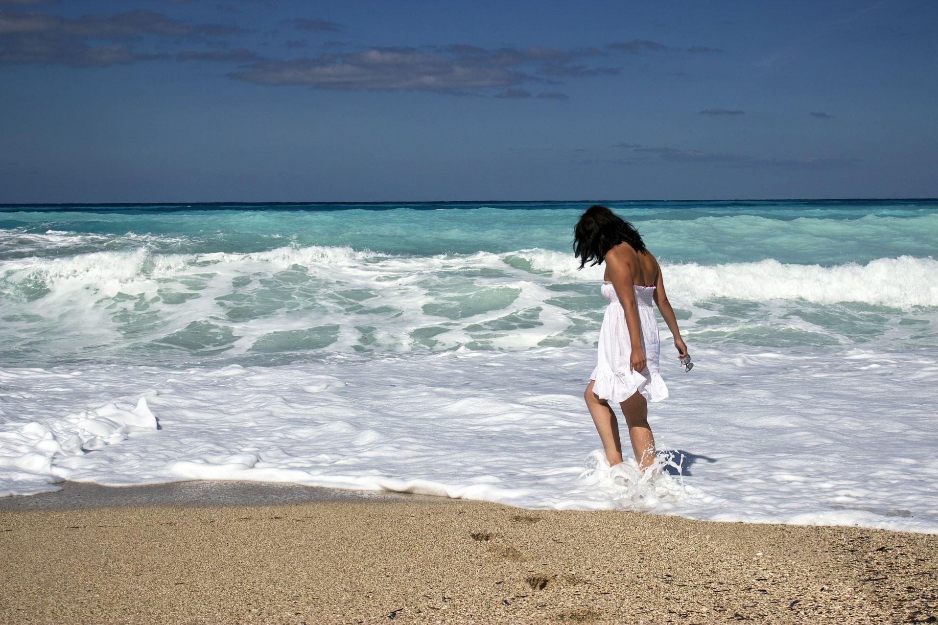 woman in white dress on beach 