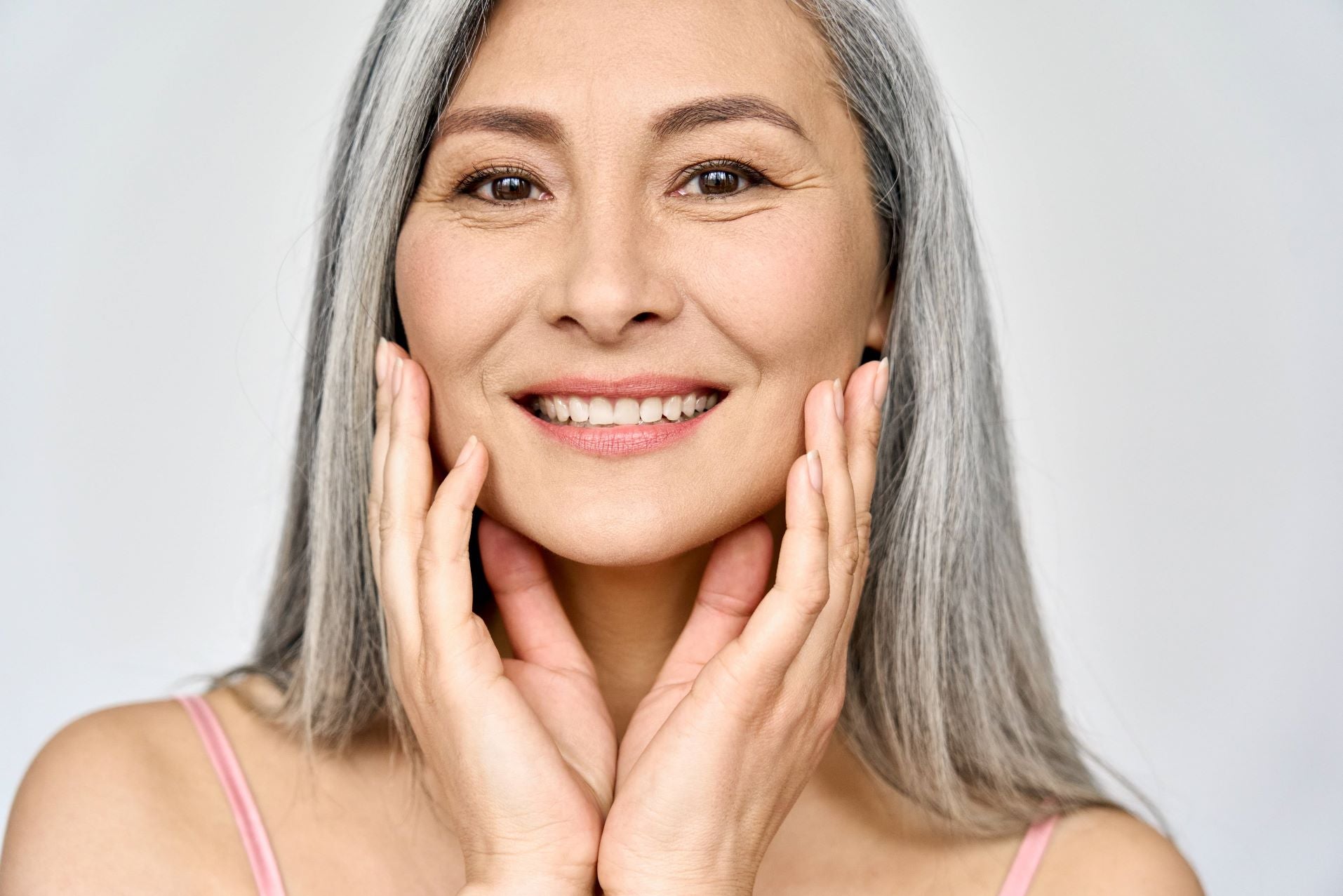Mature asian woman with silver hair