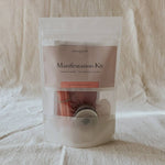Homebound Tarot Manifestation Kit packaging on a textured beige fabric background