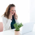 Maria Velve green beauty expert conducting live skincare webinar on laptop.