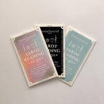 Three tarot cards from Homebound Tarot on a light gray background